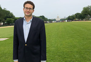 Jake Goodman poses in front of U.S. Capitol Building