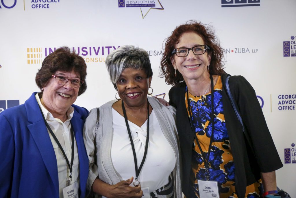 Shirley Rodriguez, Barbara Ransom, and Jean Gonsier-Gerdin pose for a photo during the Outstanding Leadership in Disability Law Awards Dinner.